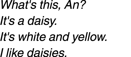 What's this, An? It's a daisy. It's white and yellow. I like daisies. 